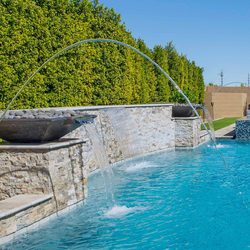 Clean waterline tile and pool water feature